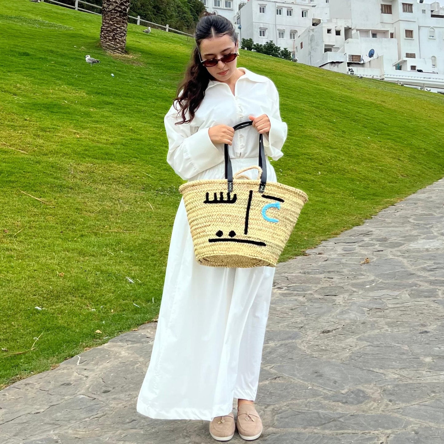 Face Motif Woven Handbag