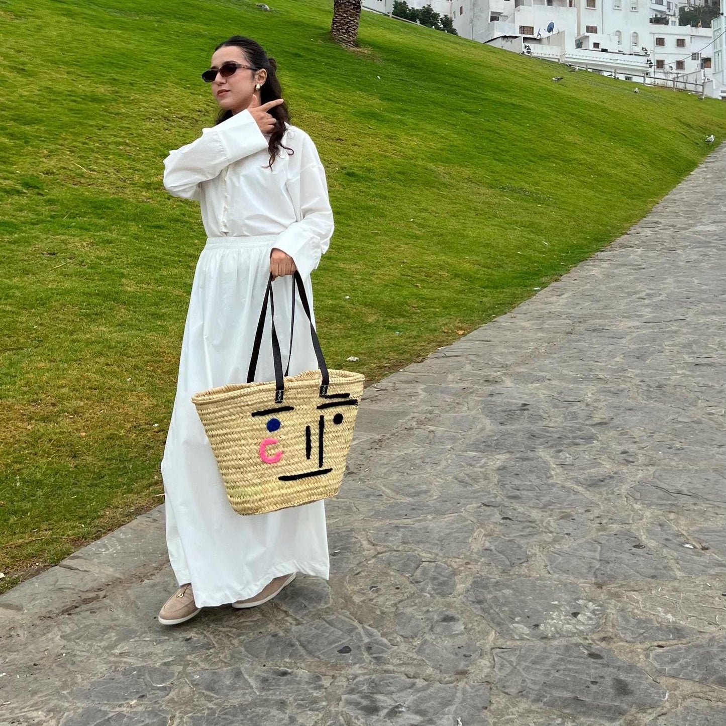 Face Motif Woven Handbag